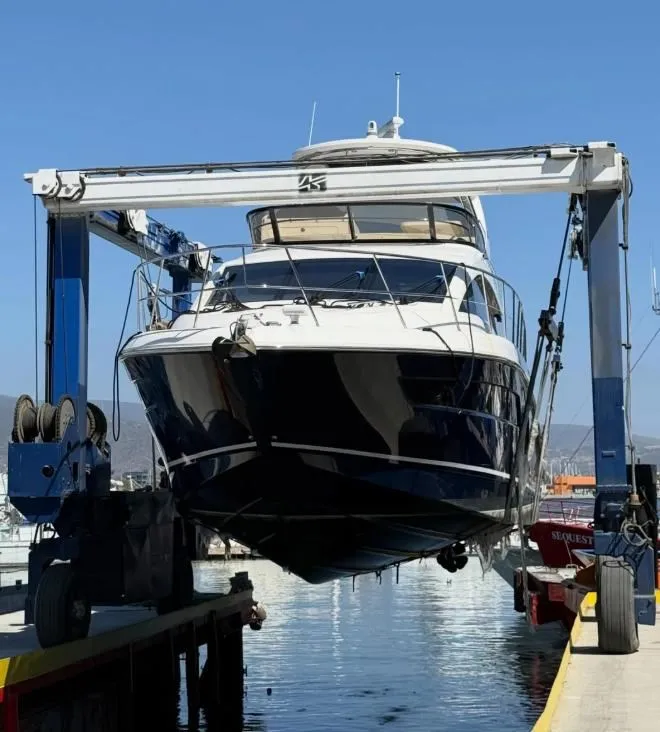 Motor yacht suspended in 70-ton travel lift at La Costa Boat Works, Ensenada